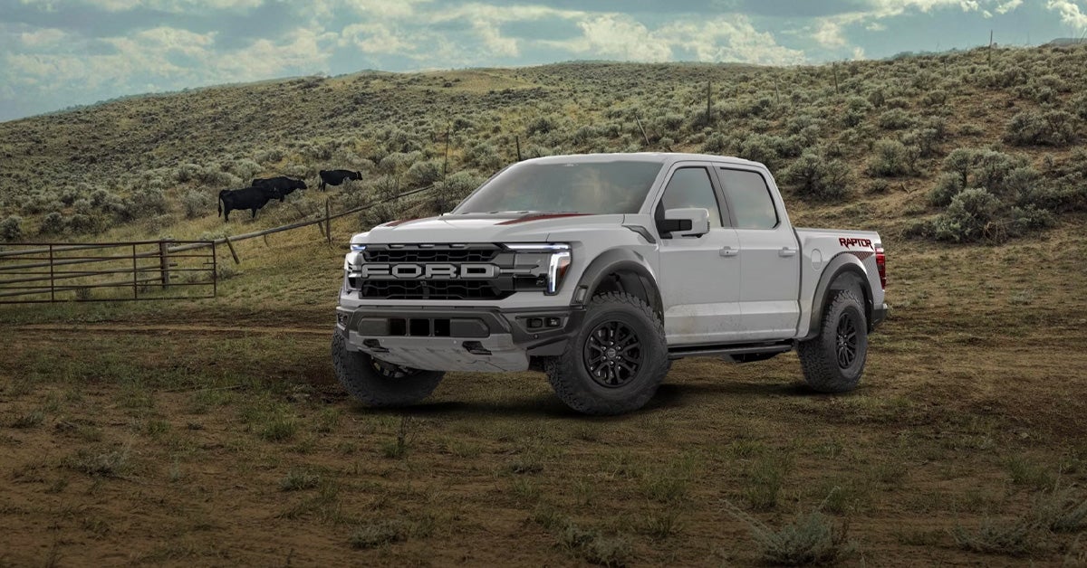 2026 Ford F-150 Raptor - Parked on a hilly, rural landscape